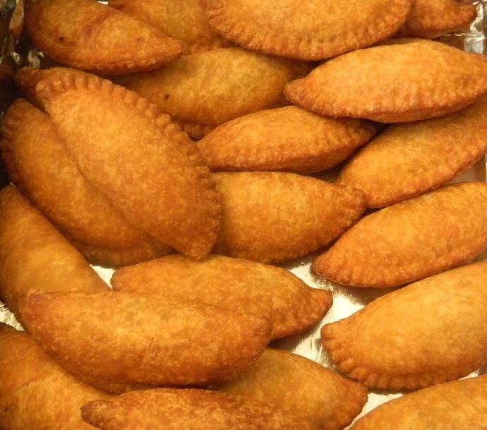 How do you make a Filipino-style empanada?